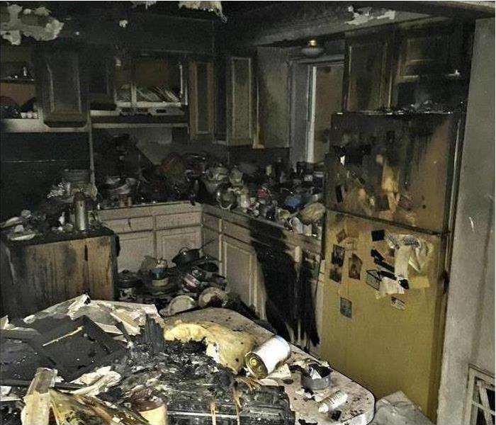 Refrigerator kitchen cabinets burned 