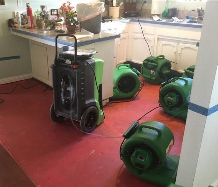Air Movers Drying Kitchen Water Damage
